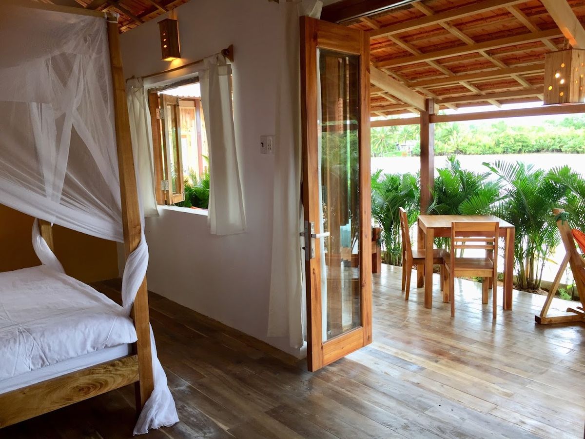 Dormstay Riverside Hostel Phu Quoc pool and grounds in An Thoi